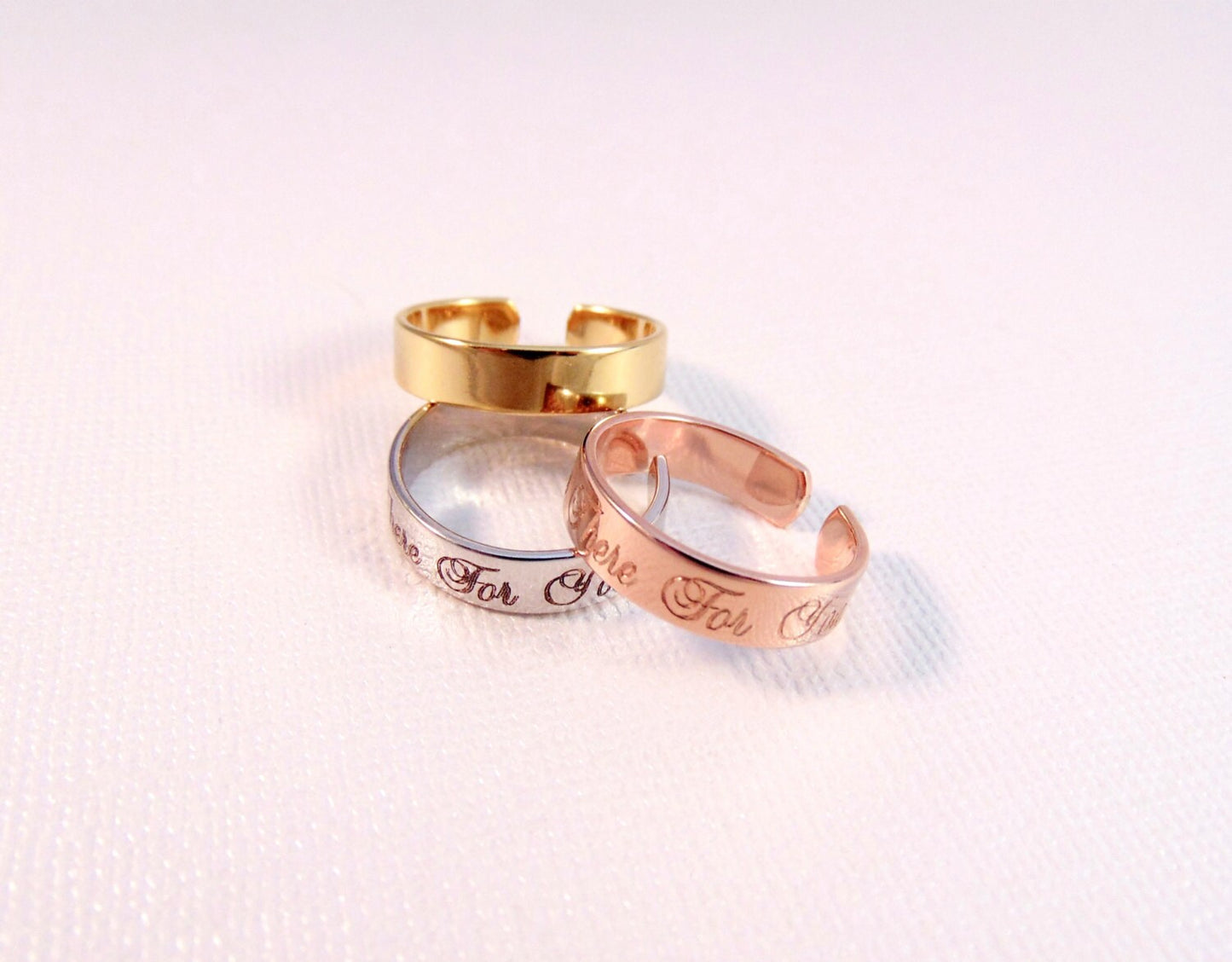 Stackable ring engraved with Child's Name or message. Adjustable band