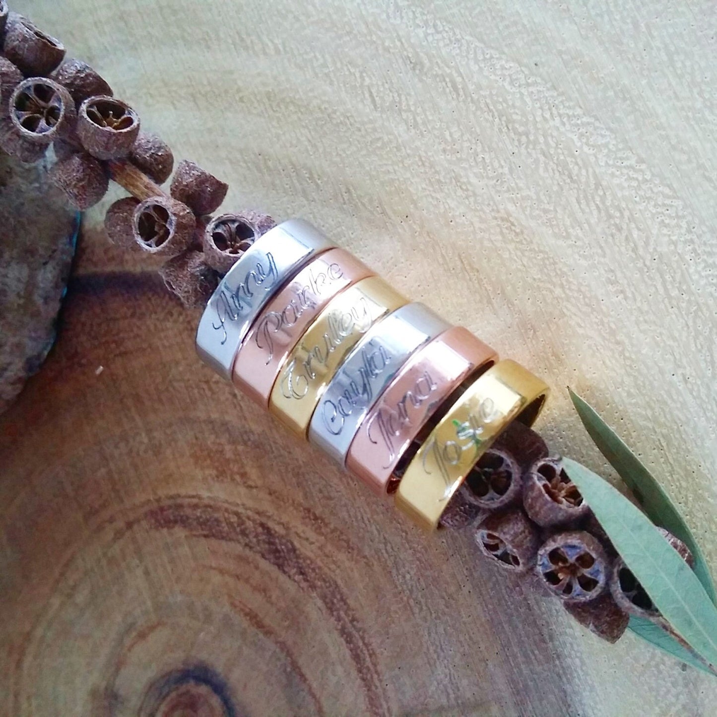 Stackable ring engraved with Child's Name or message. Adjustable band