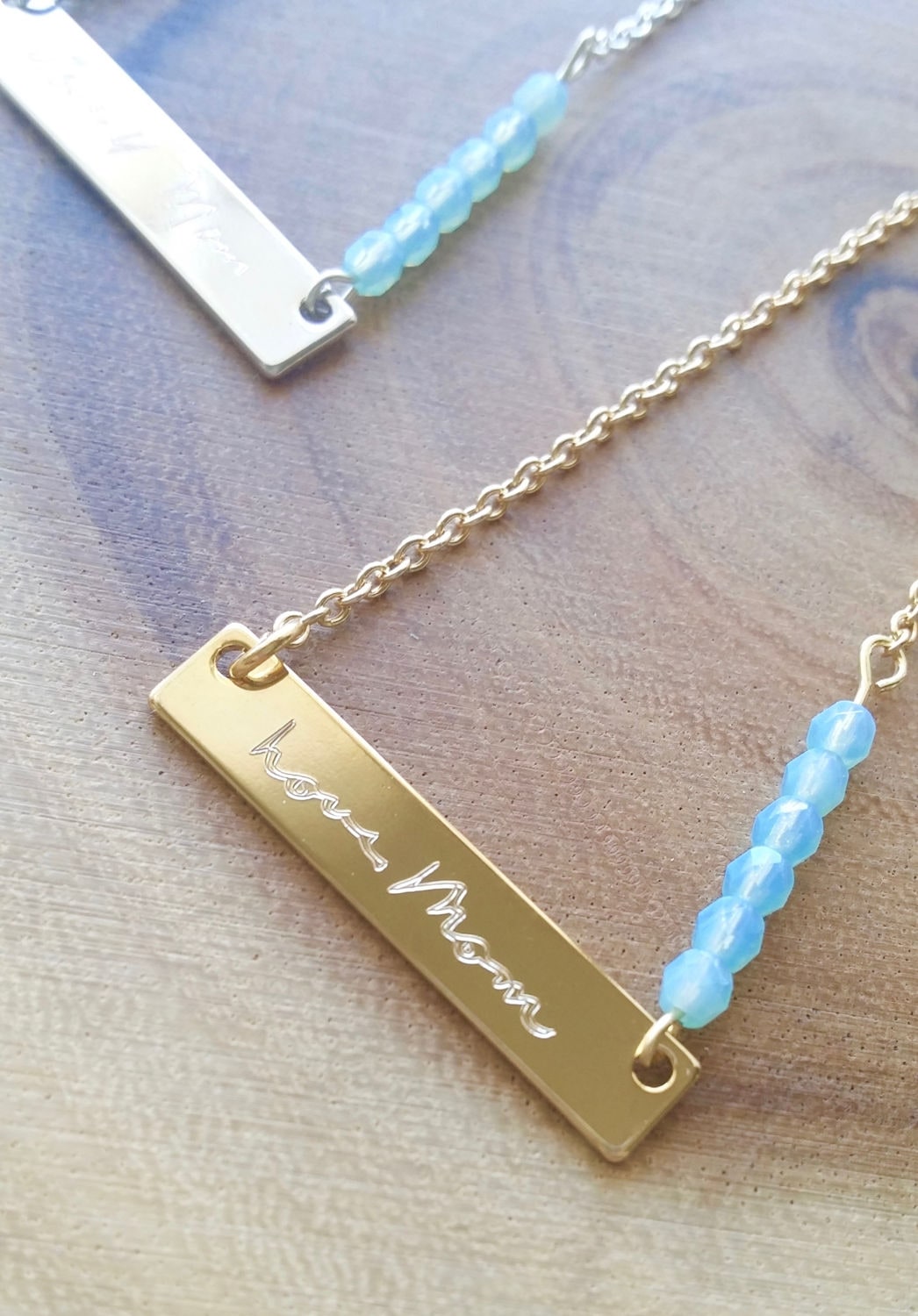 Custom handwriting engraved on gold bar necklace