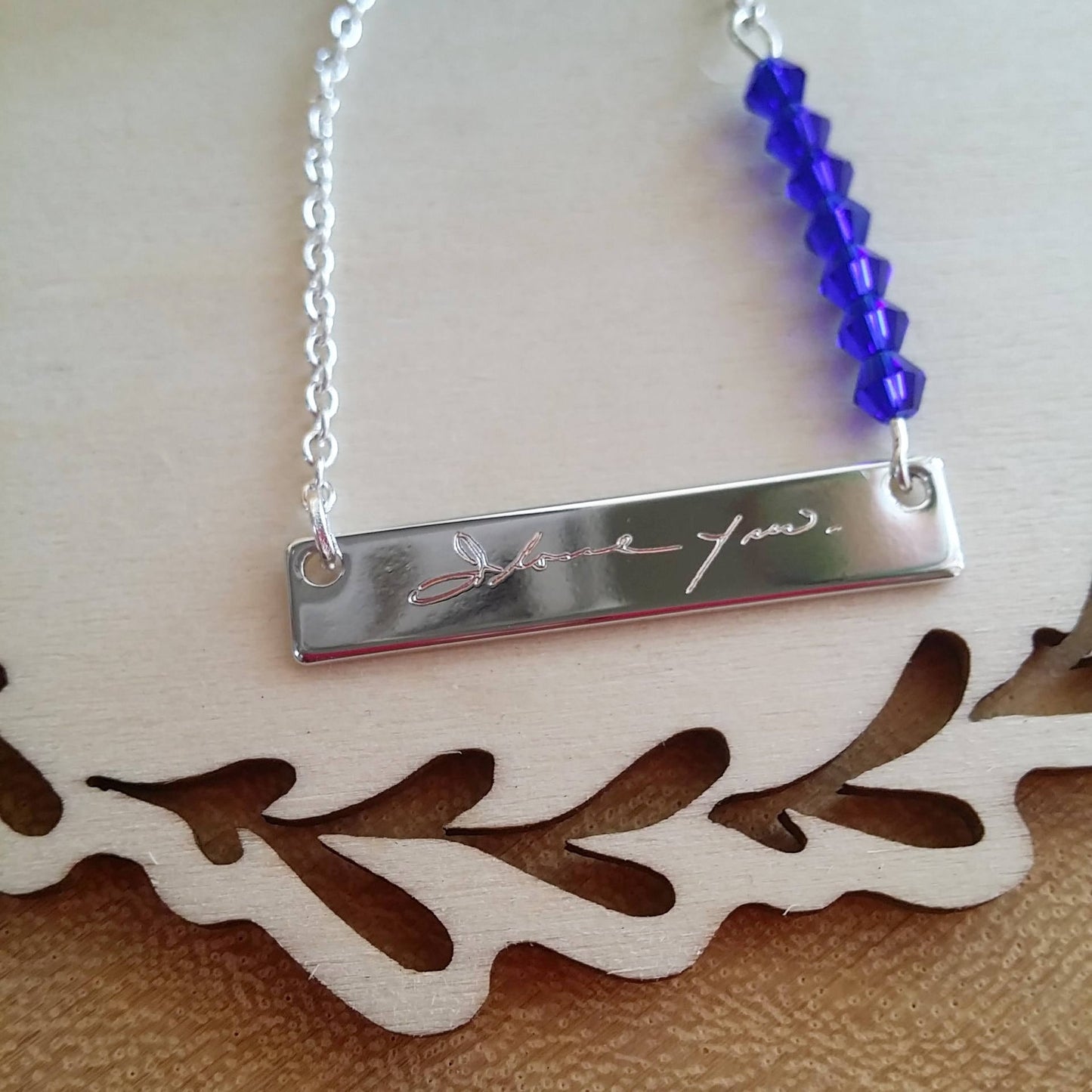 Custom handwriting engraved on gold bar necklace
