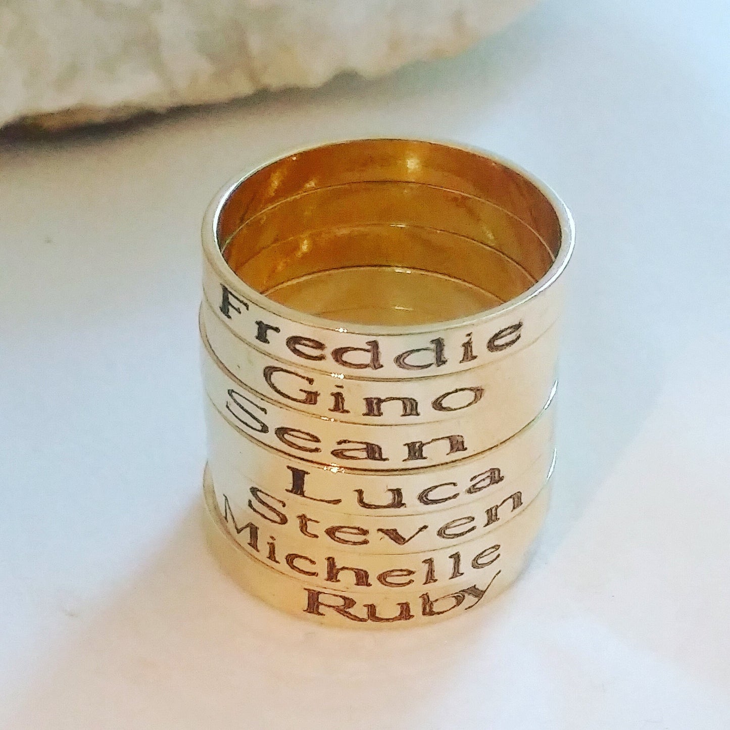 Stackable ring engraved with Child's Name or message. Adjustable band