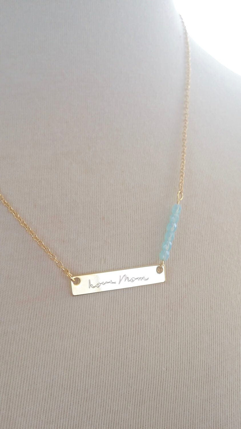 Custom handwriting engraved on gold bar necklace