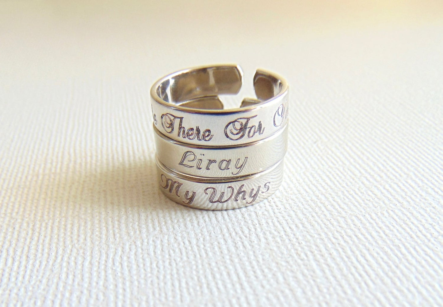 Stackable ring engraved with Child's Name or message. Adjustable band