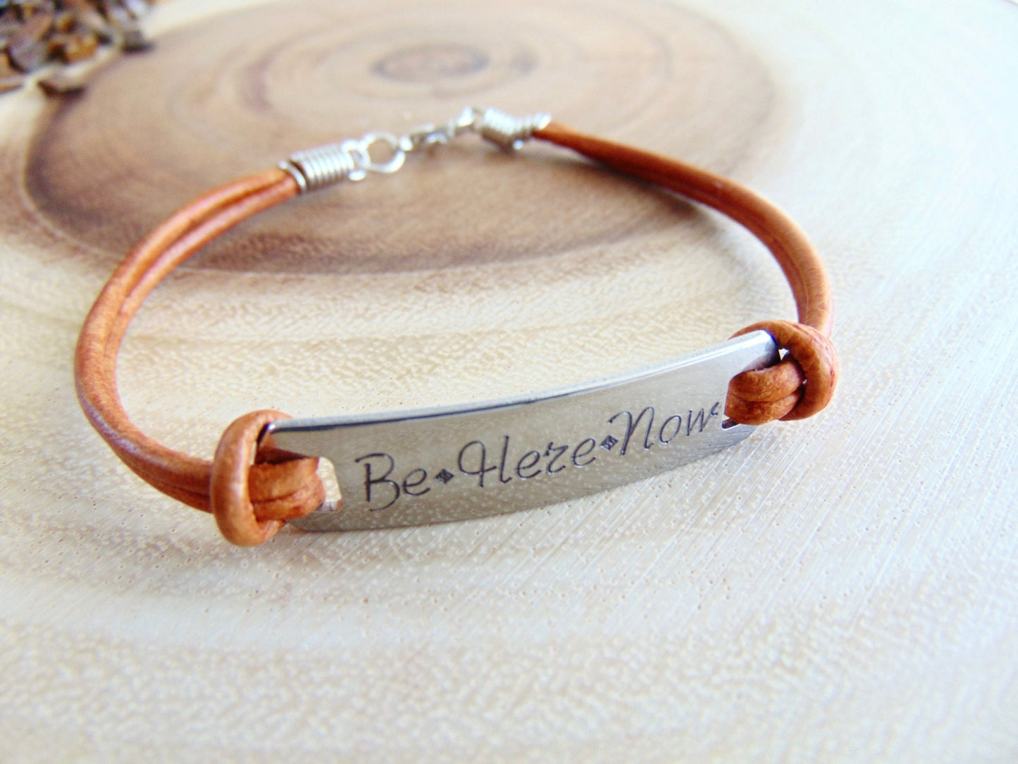 Personalized Engraved message on a bar bracelet and brown/black leather