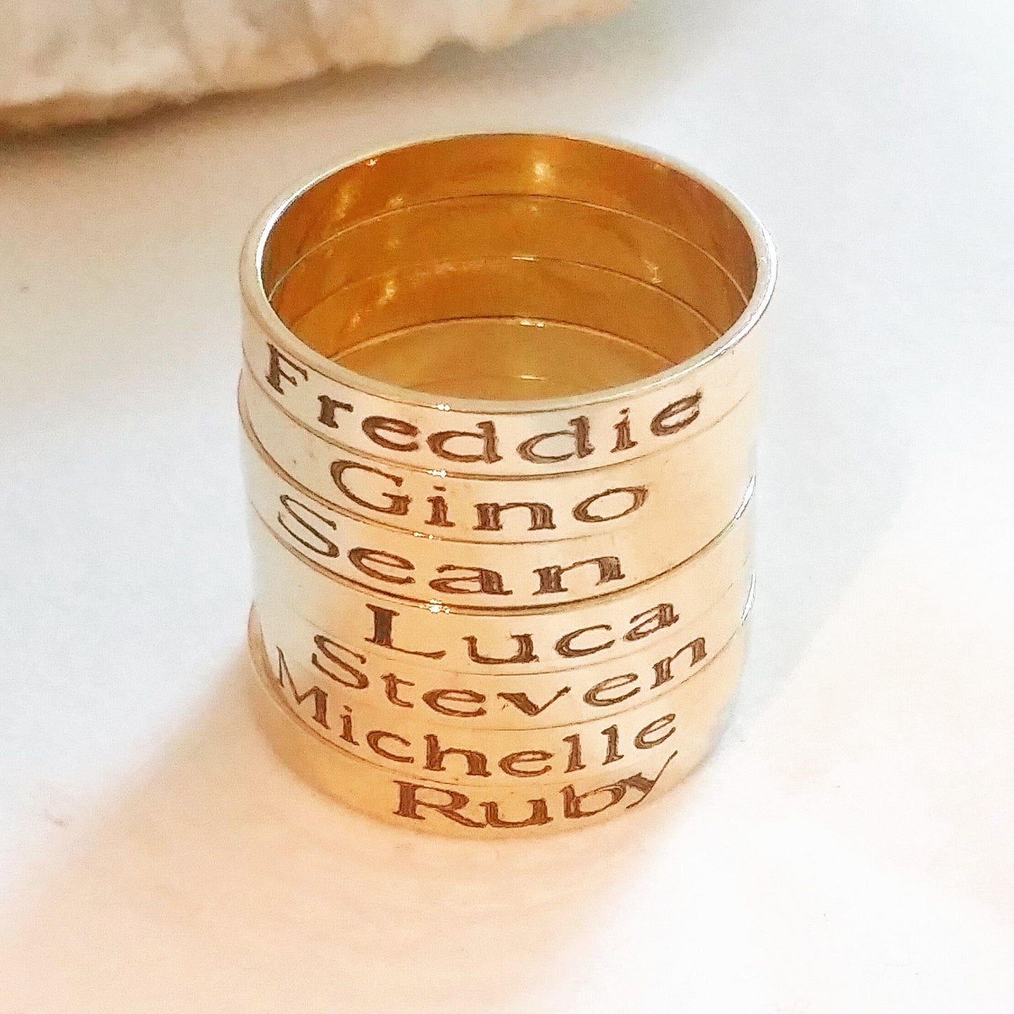Stackable ring engraved with Child's Name or message. Adjustable band